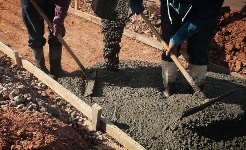 How do you prepare the ground for concrete?